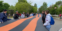 В Геническе развернули 84-метровую Георгиевскую ленту, объехавшую все Левобережье области - Херсонское агентство новостей