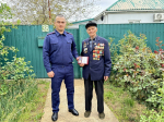 Связь поколений: следователи Херсонской области навестили ветерана-десантника