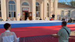 В Таврийске в первый день досрочного голосования развернули многометровый флаг России