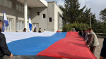 В преддверии Дня воссоединения в Херсонской области развернули флаг России